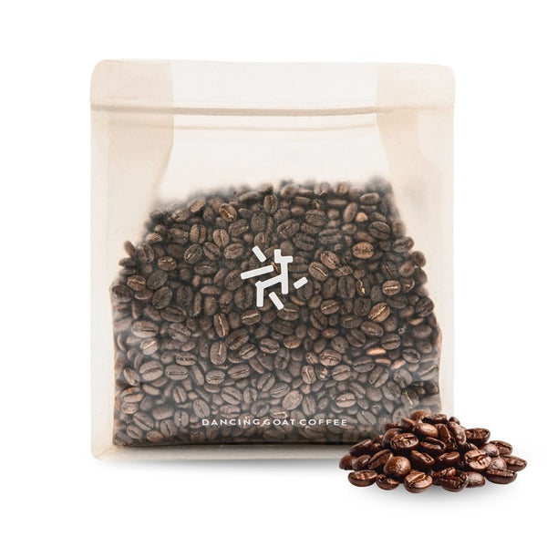 Dancing Goat specialty decaf coffee beans — whole beans close-up